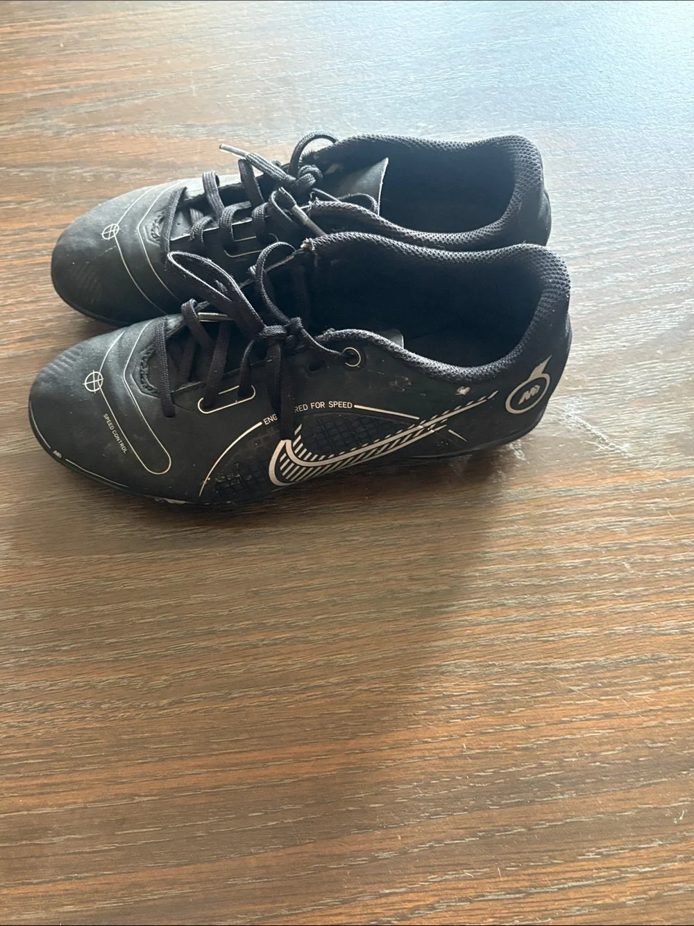 Nike Kids Black Soccer Cleats with White Swoosh
